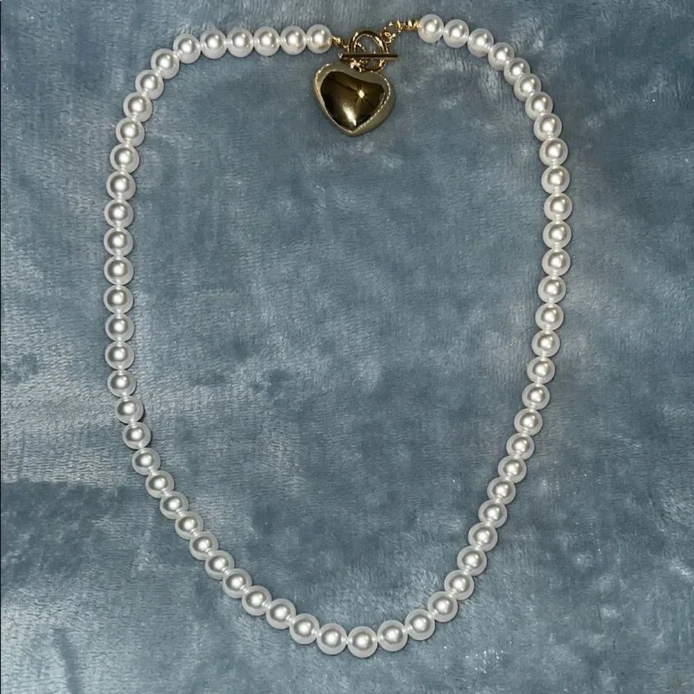 Elegant Pearl Necklace with Gold Heart Pendant